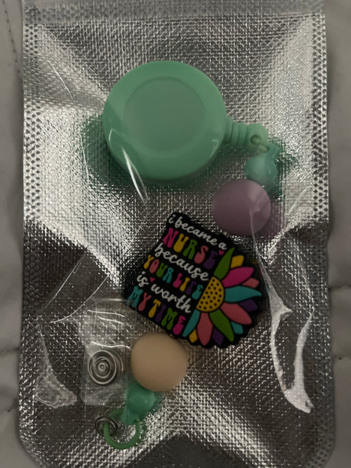 Retractable badge reel